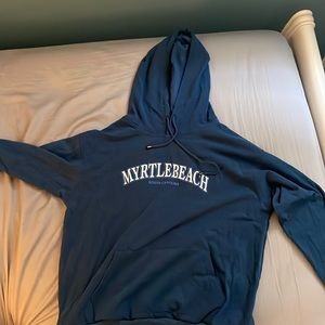 I am selling a sweatshirt it’s blue and it says Myrtle Beach on it